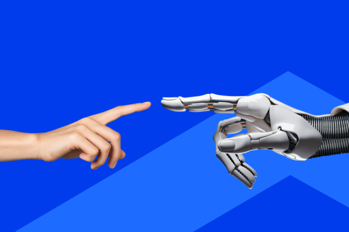 Eine menschliche Hand und eine Roboter Hand berühren sich.