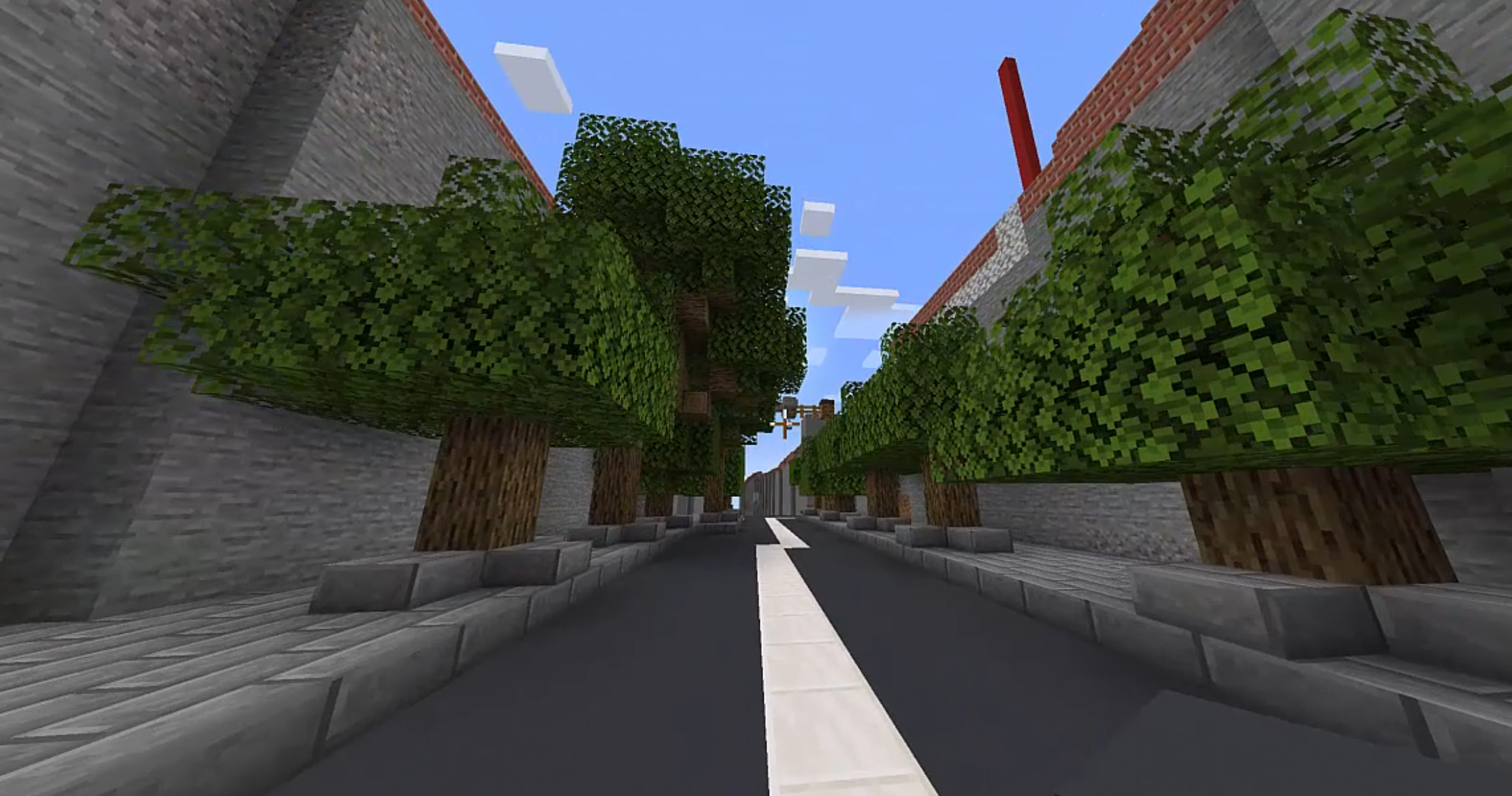 Die Implerstraße in der Nähe des Münchener Dante-Gymnasiums in Minecraft. Das Modell wurde auf der Grundlage von Daten des digitalen Zwillings von einer Schülergruppe des Gymnasiums entworfen.